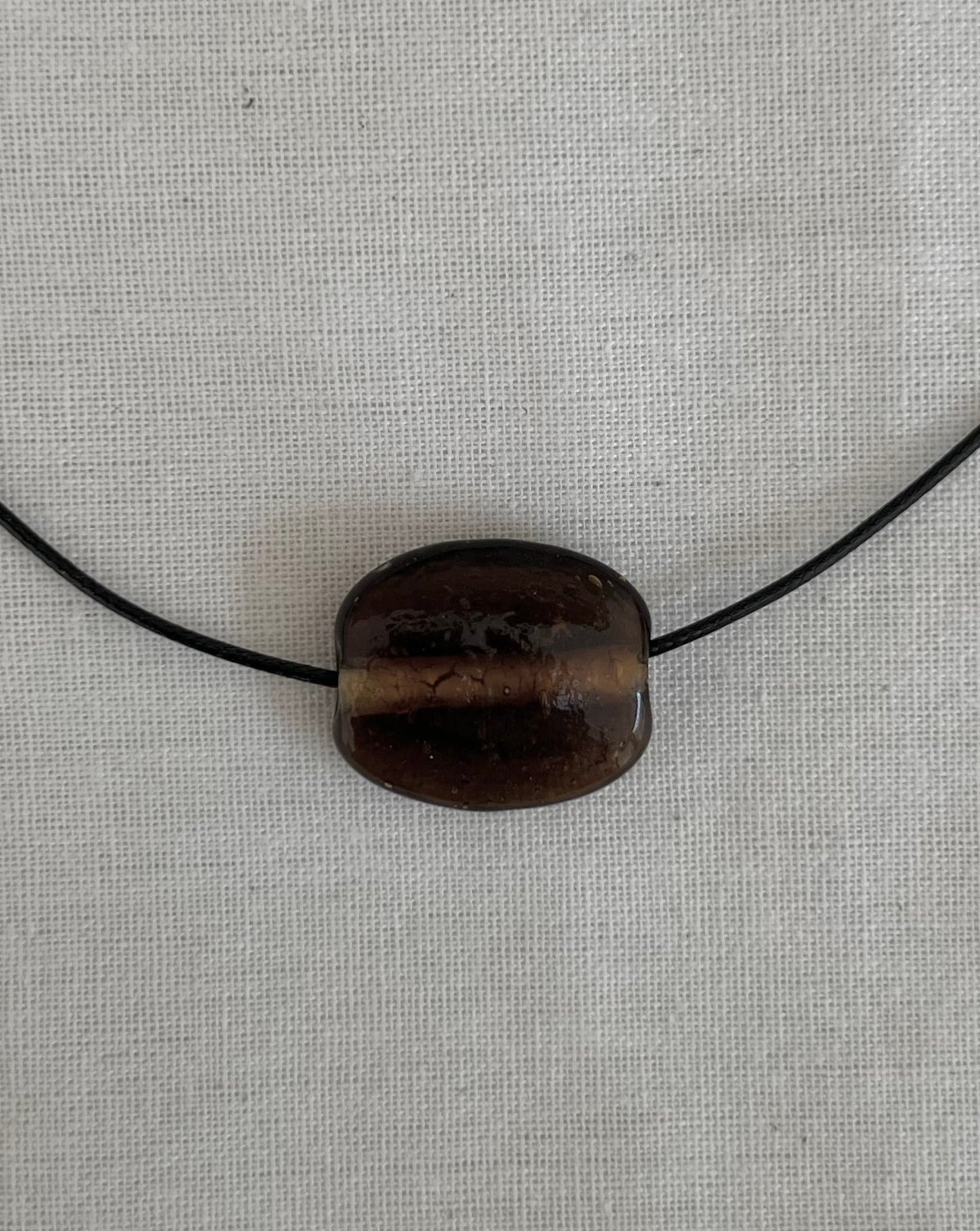 SMALL CLEAR BROWN GLASS OVAL NECKLACE