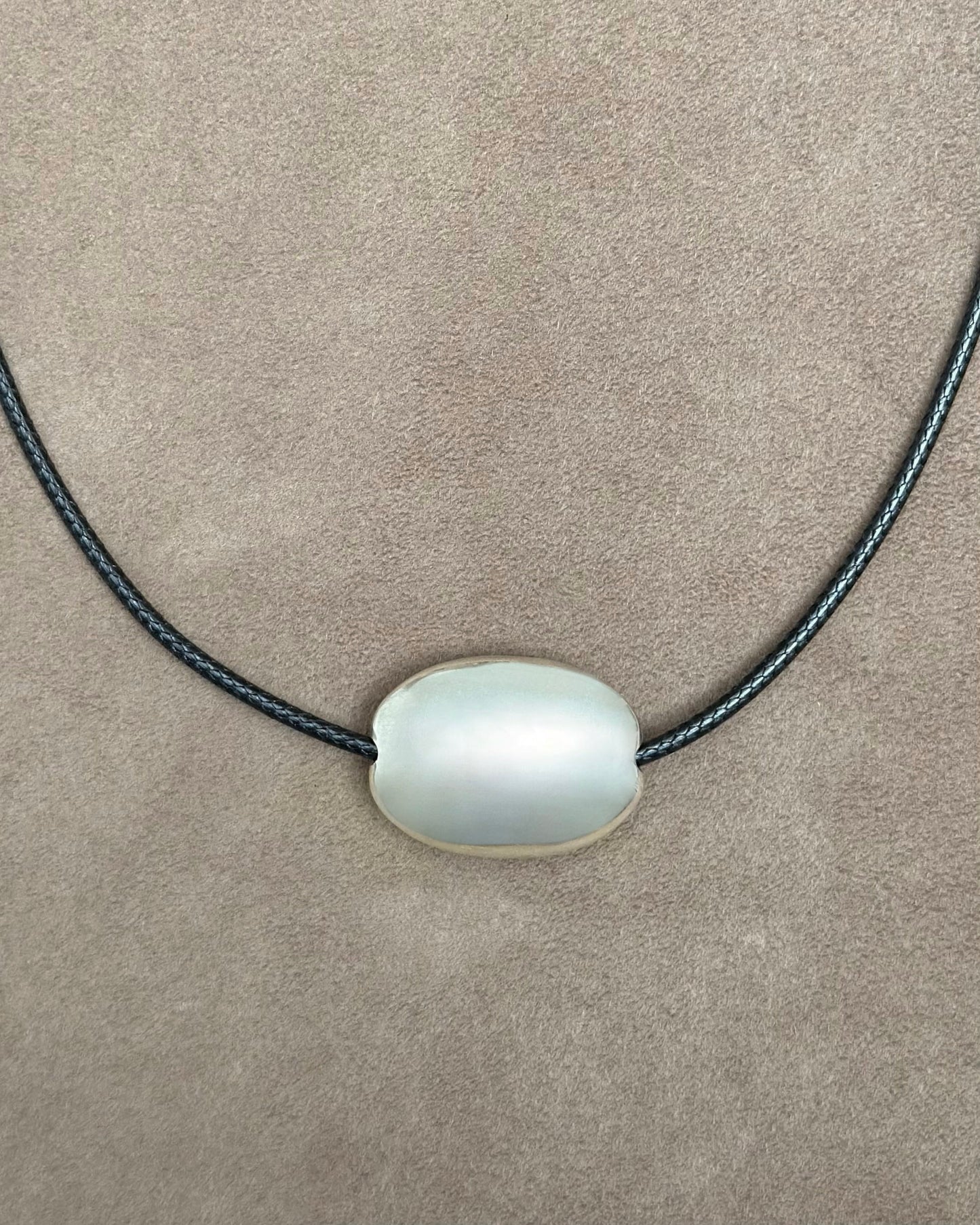 SMALL SILVER OVAL CORD NECKLACE