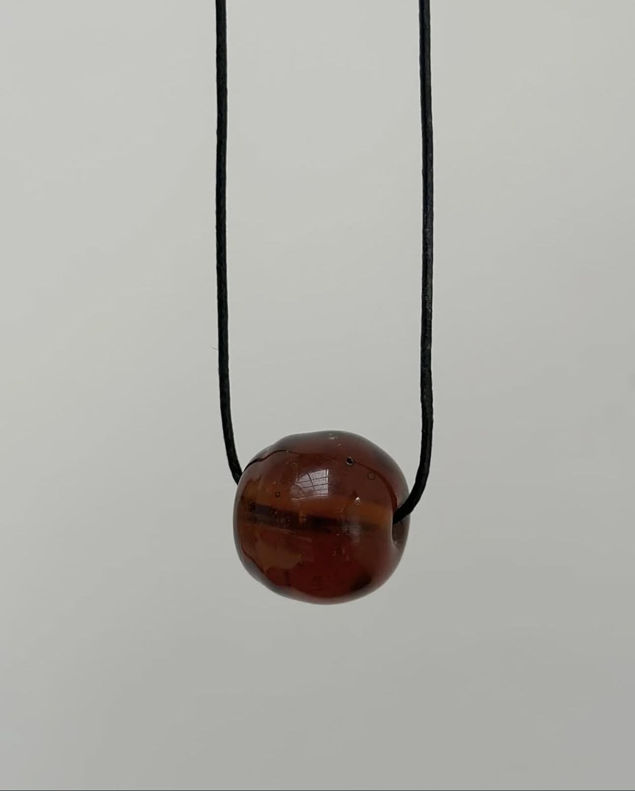 LARGE CLEAR BROWN GLASS SPHERE LONG CORD NECKLACE