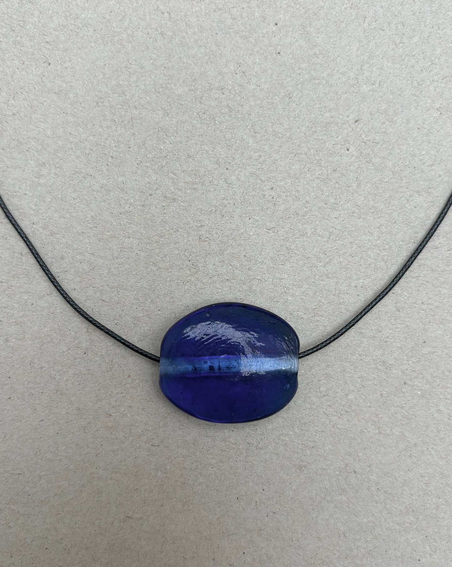 CLEAR BLUE GLASS OVAL NECKLACE