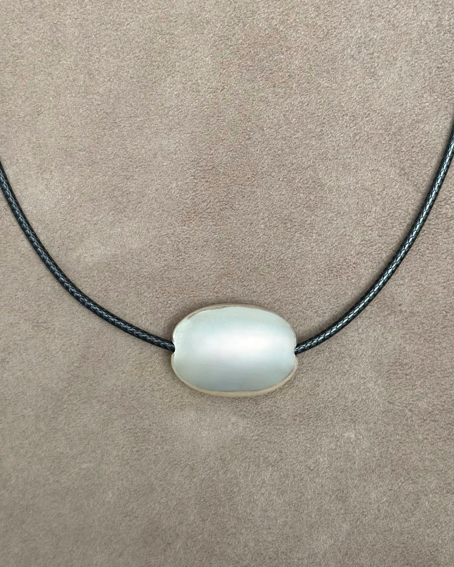SMALL SILVER OVAL LONG CORD NECKLACE
